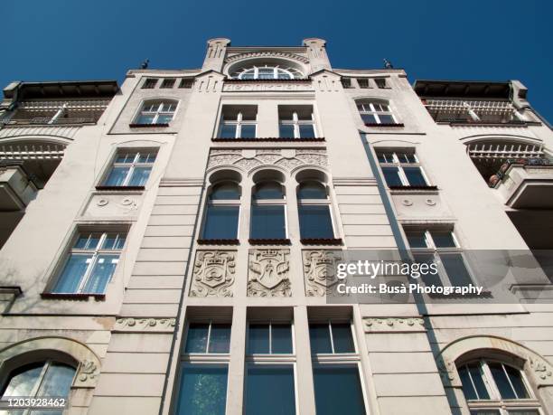 facades of art nouveau residential buildings in the district of neukoelln, berlin, germany - berlin modernism housing estates stock pictures, royalty-free photos & images