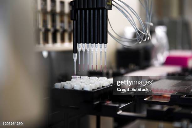 genomic laboratory equipment - precision medicine stock pictures, royalty-free photos & images