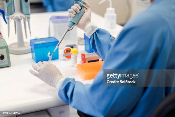 sample collection from test tube - medical research stock pictures, royalty-free photos & images