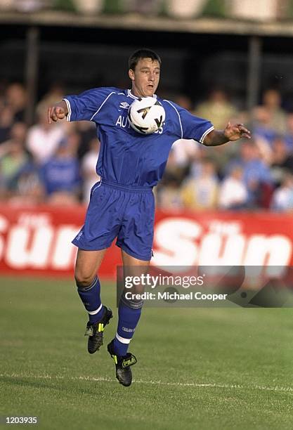 John Terry of Chelsea in action during a Pre-Season Friendly against Omagh played in Omagh, Northern Ireland. \ Mandatory Credit: Michael Cooper...