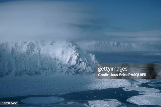 The island of little Diomede in Alaska, United States - Bering Sea, foreground, the island of Little Diomede , background Big Diomede, time zone...