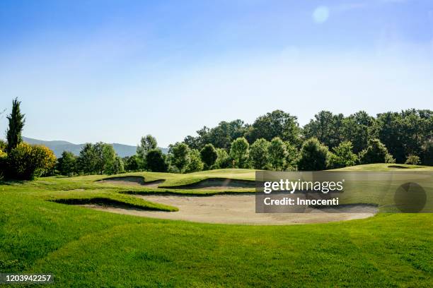 peaceful scenic view of golf course - golfbana bildbanksfoton och bilder