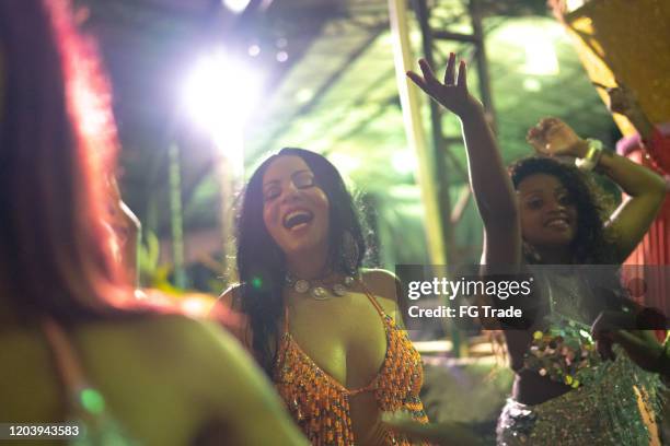 people celebrating and dancing brazilian carnival - multicultural gala an evening of many cultures stock pictures, royalty-free photos & images