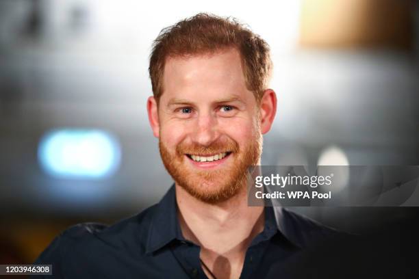 Prince Harry, Duke of Sussex speaks with members of the Invictus Games Choir at Abbey Road Studios, where a single has been recorded for the Invictus...