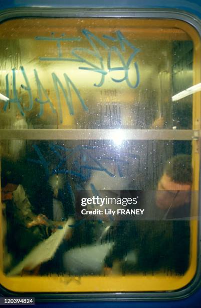 In the subway RER in Paris, France in 1990 - Sleepy traveler