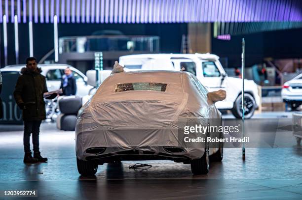 Exhibitors have to dismantle their displays after cancellation of the Geneva Auto Show on February 28, 2020 in Geneva, Switzerland. Swiss authorities...