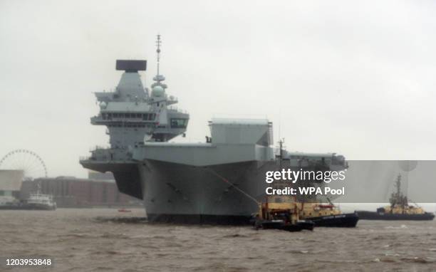 The Royal Navy aircraft carrier HMS Prince of Wales sails up the River Mersey to Liverpool for a week-long visit to the city on February 28, 2020 in...