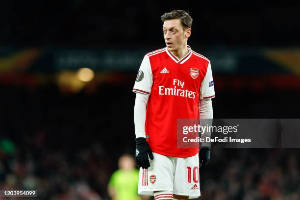 Mesut Oezil of Arsenal FC looks on during the UEFA Europa League round of 32 second leg match between Arsenal FC and Olympiacos FC at Emirates...