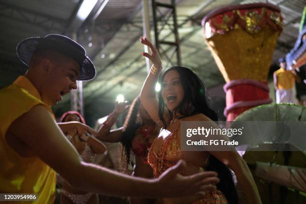 people celebrating and dancing brazilian carnival - festival float stock pictures, royalty-free photos & images