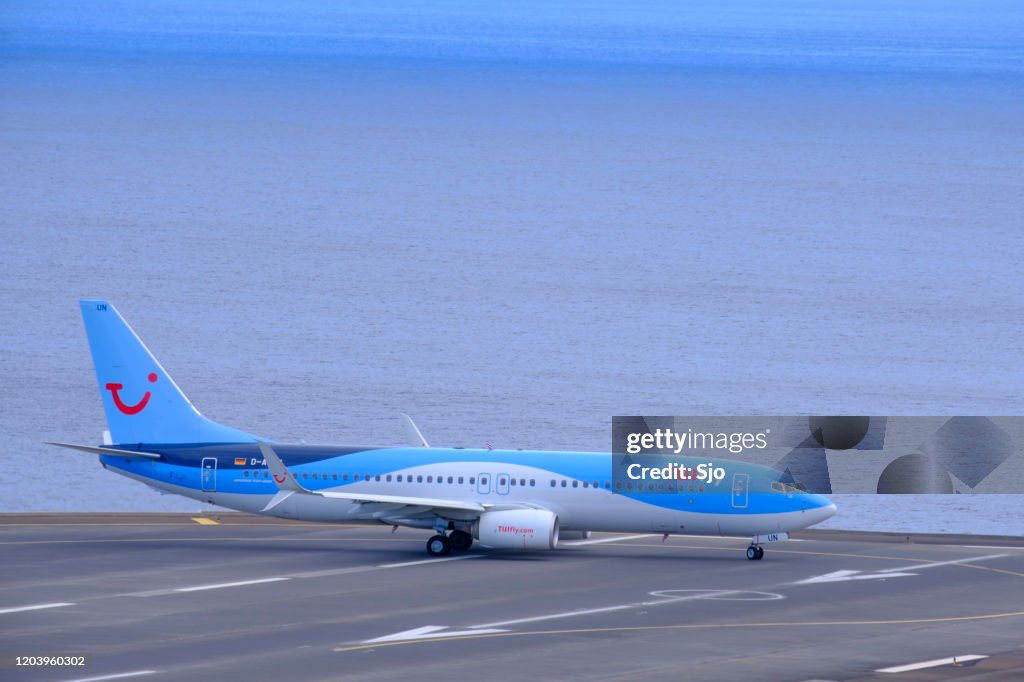 TUI Boeing 737 Airplane preparing to take off from Airport Cristiano Ronaldo on Madeira  island, Portugal