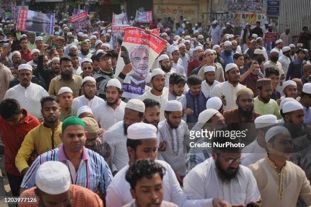Bangladeshi Muslim shout slogans as they protest the violence against Muslims in India and Indian Prime Minister Narendra Modi's scheduled visit to...