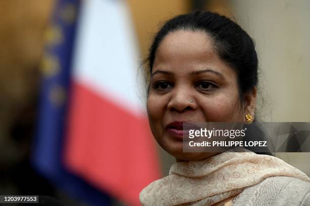 Asia Bibi, a Pakistani Christian woman, arrives for a meeting witht French President, on February 28, 2020 at the Elysee Palace in Paris. - Asia...