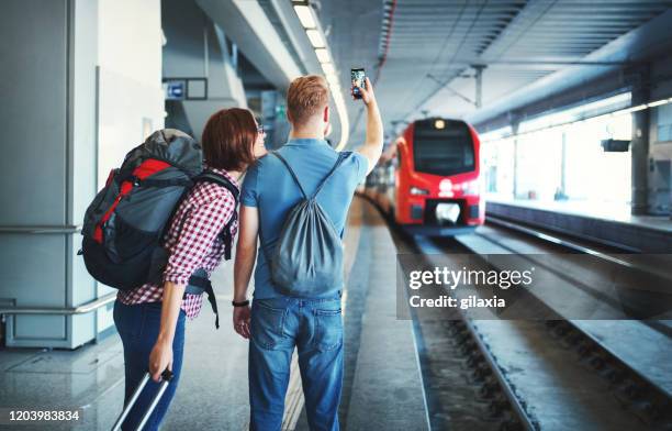 Getting Train Couple Getting On A Train Photos and Premium High Res Pictures - Getty ...
