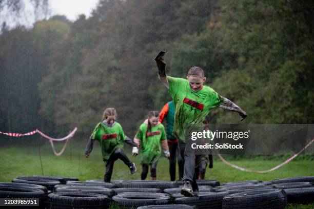 this is how you do it - assault courses stock pictures, royalty-free photos & images