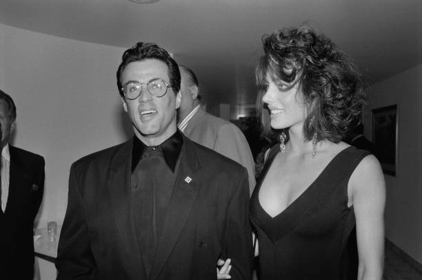 American actor, director, screenwriter, and producer Sylvester Stallone and American fashion model and businesswoman Jennifer Flavin at an event in...
