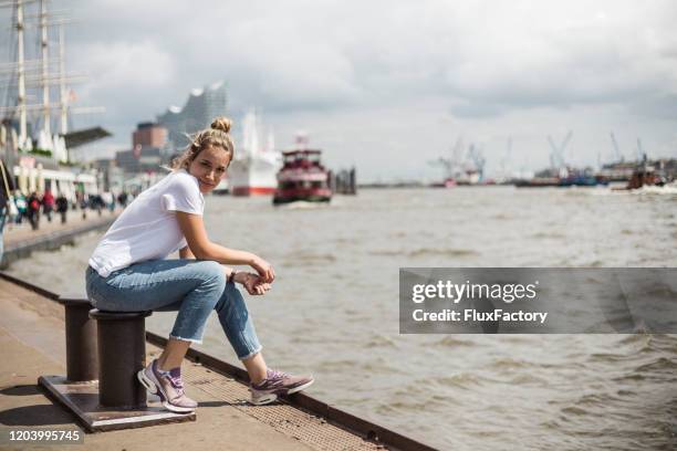 blond girl enjoying fresh air - hamburg germany port stock pictures, royalty-free photos & images