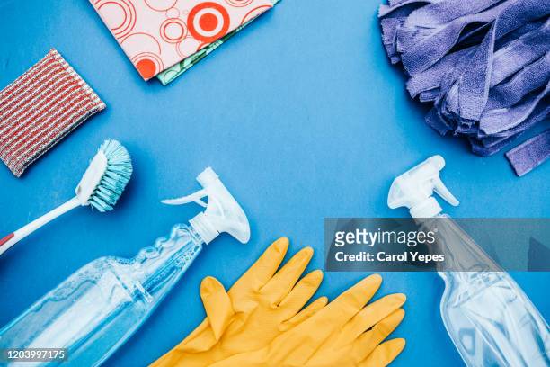 top view collection of cleaning supplies - red glove foto e immagini stock