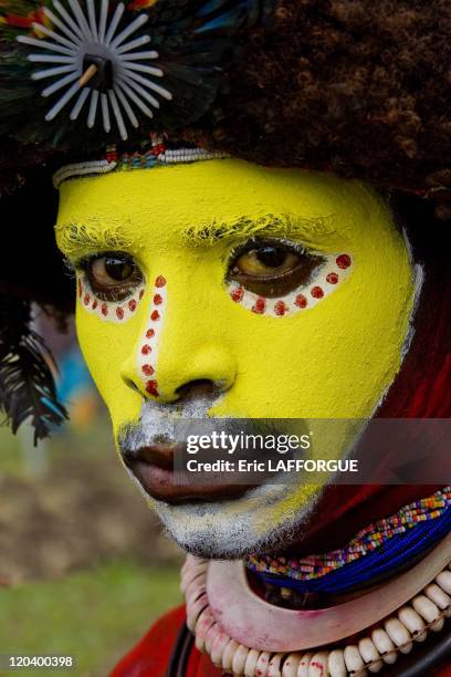 Huli warrior face with his wig papua in Papua New Guinea.