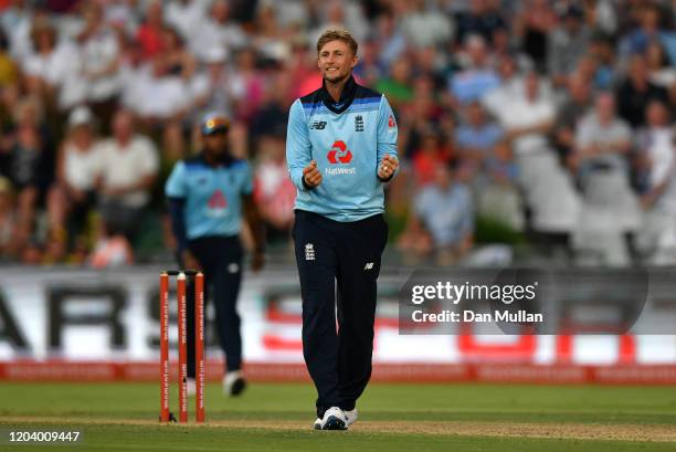 Joe Root of England celebrates after taking the wicket of Quinton de Kock of South Africa during the First One Day International match between South...