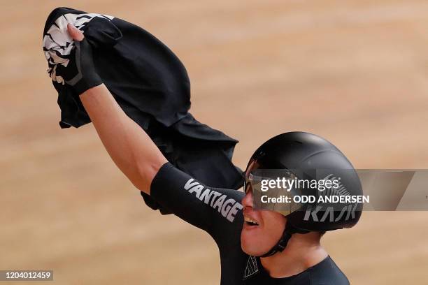 New Zealand's Corbin Strong celebrates Gold in the men's 40km points race final at the UCI track cycling World Championship at the velodrome in...