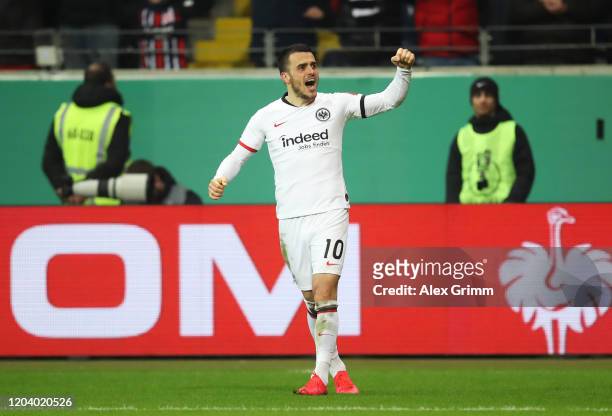 Filip Kostic of Eintracht Frankfurt celebrates after scoring his team's second goal during the DFB Cup round of sixteen match between Eintracht...