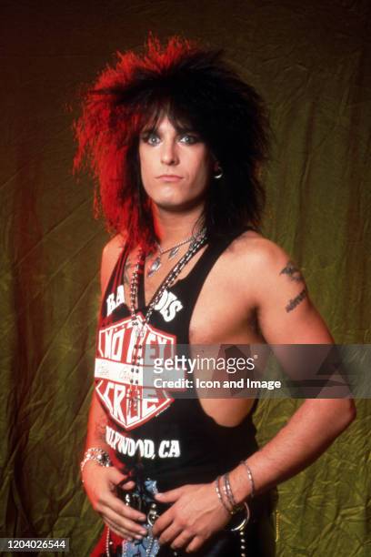 American songwriter, musician, and co-founder of the hard rock band Mötley Crüe, Nikki Sixx, poses for a portrait backstage at the Joe Louis Arena...