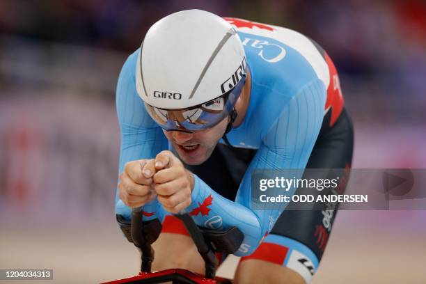 Canada's Vincent De Haitre competes in the men's 1000m time trial final at the UCI track cycling World Championship at the velodrome in Berlin on...