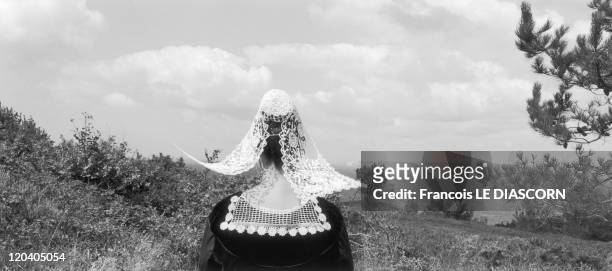 Sizun, Brittany, France - Breton woman in costume from the Baud region of Brittany, Ajoncs festival, Beuzec-Cap Sizun, Finistere department.