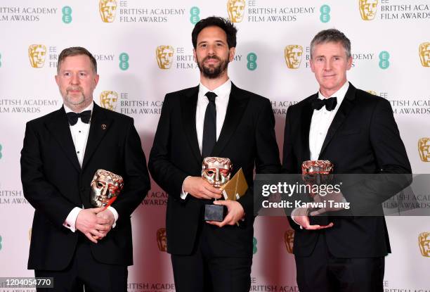 Greg Butler, Guillaume Rocheron and Dominic Tuohy, winners of the Best Special Visual Effects for "1917", pose in the Winners Room during the EE...