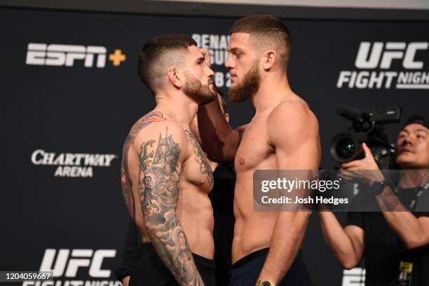 Sean Brady and Ismail Naurdiev of Austria face off during the UFC Fight Night ceremonial weigh-in at Chartway Arena on February 28, 2020 in Norfolk,...