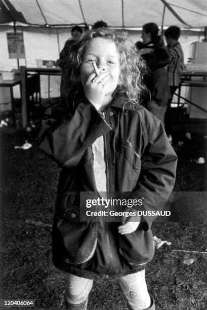 Tinkers in Letterkenny, Ireland in May 1995 - Donegal County, Letterkenny, Tinkers little girl smoking a cigarette.