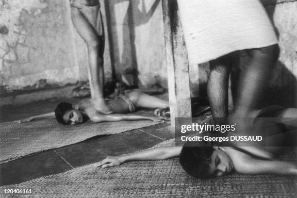Kerala, India in 1999 - Kathakali school in kalamandalam, cheruthuruthy, kerala, india, 1999. Two dancers are massaged before dancing.