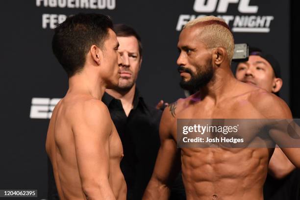 Joseph Benavidez and Deiveson Figueiredo of Brazil face off during the UFC Fight Night ceremonial weigh-in at Chartway Arena on February 28, 2020 in...