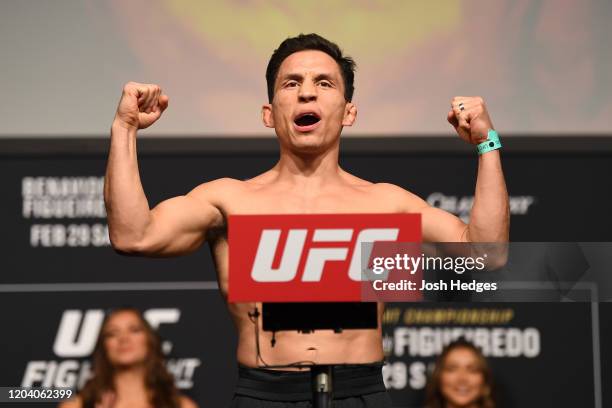 Joseph Benavidez poses on the scale during the UFC Fight Night ceremonial weigh-in at Chartway Arena on February 28, 2020 in Norfolk, Virginia.