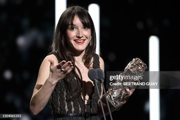 French actress Anais Demoustier delivers a speech on stage after she won the Best Actress award for "Alice et le Maire " during the 45th edition of...