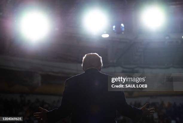 President Donald Trump gestures as he speaks during a Keep America Great campaign rally at the North Charleston Coliseum in North Charleston, South...