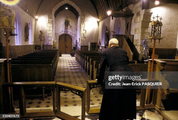The Priest Solitaire In France In 1987 - Saturday night, church Chamblac is ready for Sunday morning mass-It was restored by the reverend-a Country...