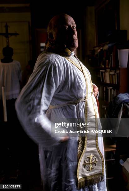 The Priest Coquettish In France In 1987 - Father cares for his image with a little flirtation-a Country Priest: Father Montgomery Quintin Wright of...