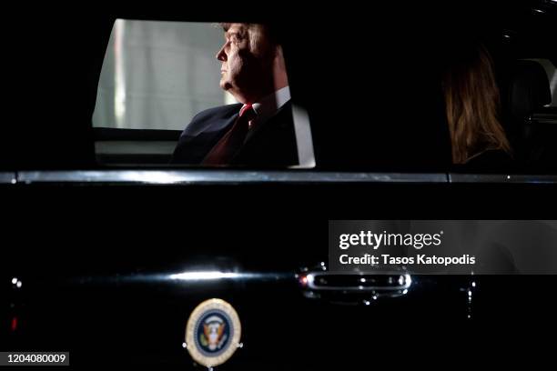 President Donald Trump and First Lady Melania Trump sit in the presidential motorcade on the South Lawn of the White House on February 04, 2020 in...