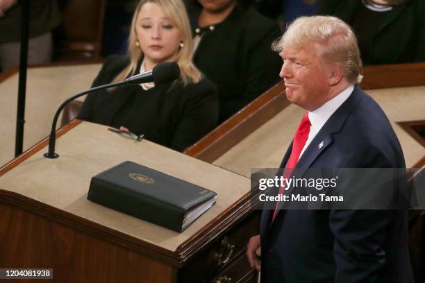 President Donald Trump steps to the lectern for the State of the Union address in the chamber of the U.S. House of Representatives on February 04,...