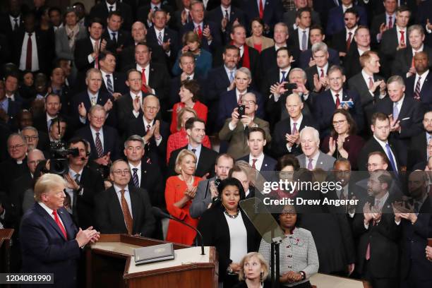 President Donald Trump steps to the lectern for the State of the Union address in the chamber of the U.S. House of Representatives on February 04,...