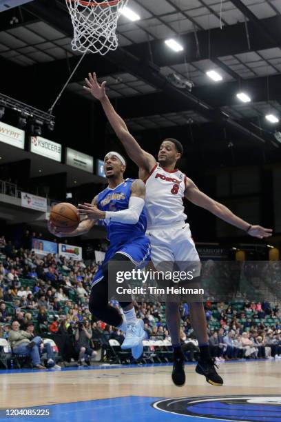 Brandon Fields of the Texas Legends drives against Trey Mourning of the Sioux Falls Skyforce during the first quarter on February 28, 2020 at...