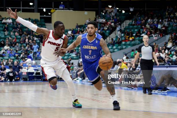 Cameron Payne of the Texas Legends drives against Bubu Palo of the Sioux Falls Skyforce during the first quarter on February 28, 2020 at Comerica...