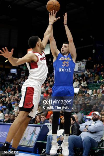 Dakota Mathias of the Texas Legends shoots against Trey Mourning of the Sioux Falls Skyforce during the second quarter on February 28, 2020 at...