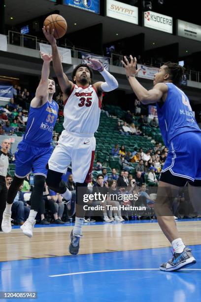 Gabe Vincent of the Sioux Falls Skyforce shrives against Moses Brown of the Texas Legends during the third quarter on February 28, 2020 at Comerica...