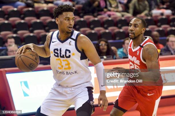 Trevon Bluiett of the Salt Lake City Stars handles the ball ahead of Marquis Teague of the Memphis Hustle in an NBA G-League game on February 28,...