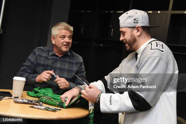 Los Angeles Kings Head Coach Todd McLellan speaks with a fan during the LA Kings Festival at STAPLES Center on February 27, 2020 in Los Angeles,...