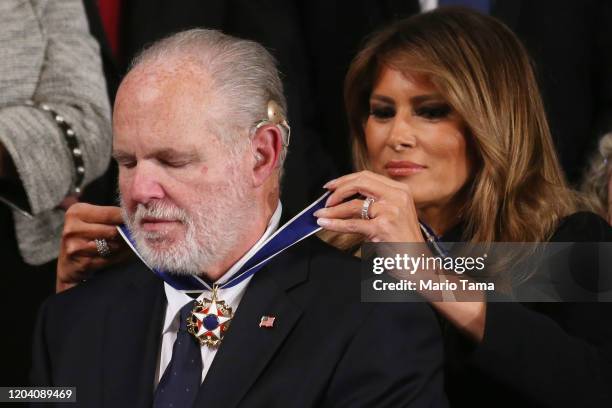 Radio personality Rush Limbaugh reacts as First Lady Melania Trump gives him the Presidential Medal of Freedom during the State of the Union address...