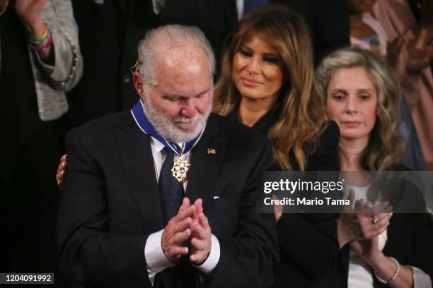 Radio personality Rush Limbaugh reacts after First Lady Melania Trump gives him the Presidential Medal of Freedom during the State of the Union...