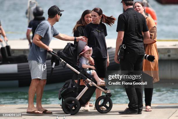 New Zealand Prime Minister Jacinda Ardern with her daughter Neve Gayford and partner Clarke Gayford after she joined the the crew on the Te Whanau...